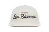 Los Blancos
    wool baseball cap indicator